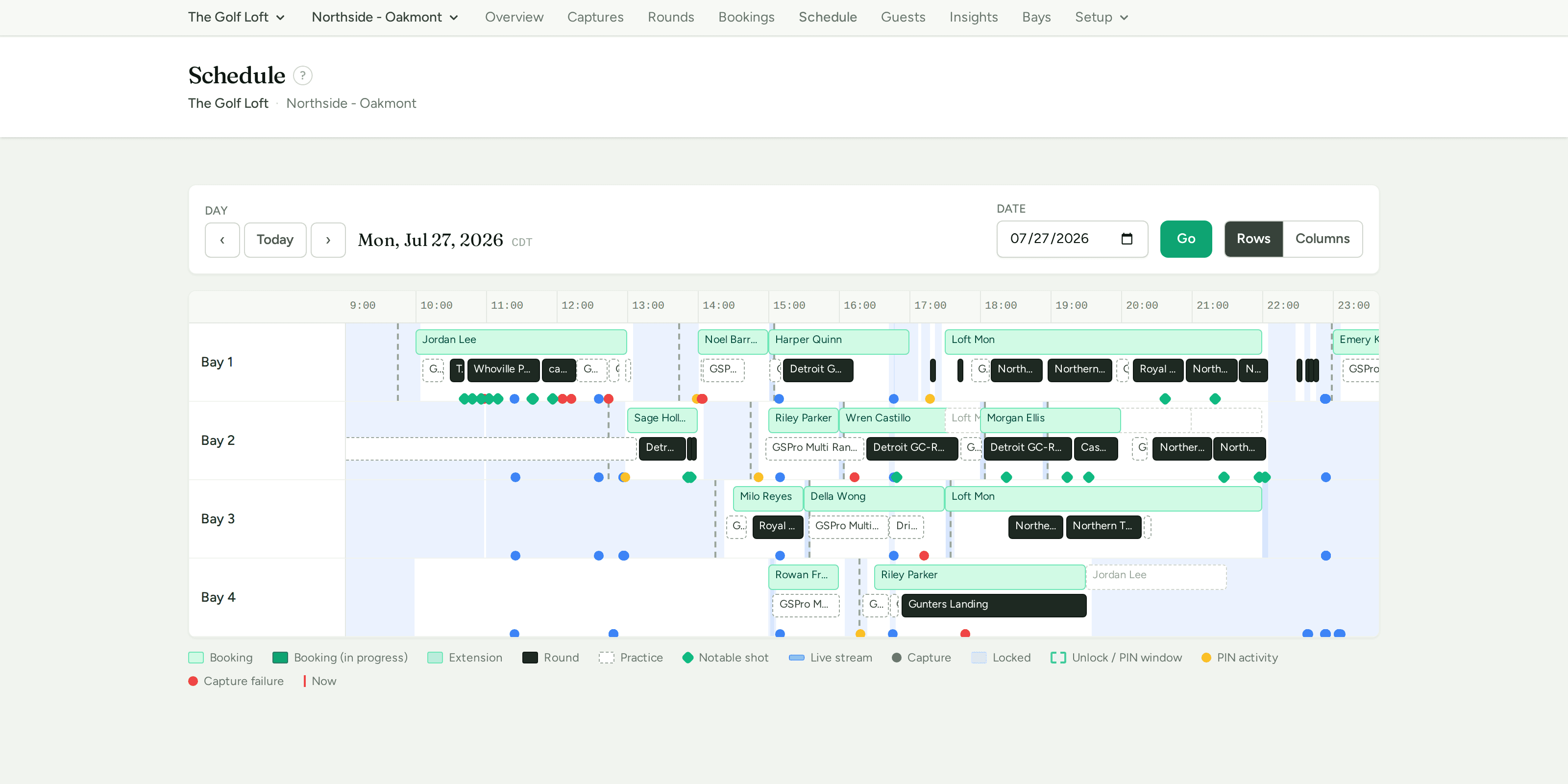 The schedule: a bays-by-time grid for a full day, with bookings, rounds, extensions, lock bands and notable-shot markers aligned across four bays